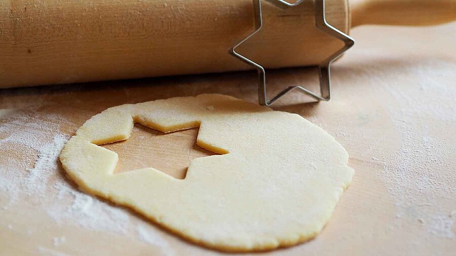 Cookie dough and star cookie form