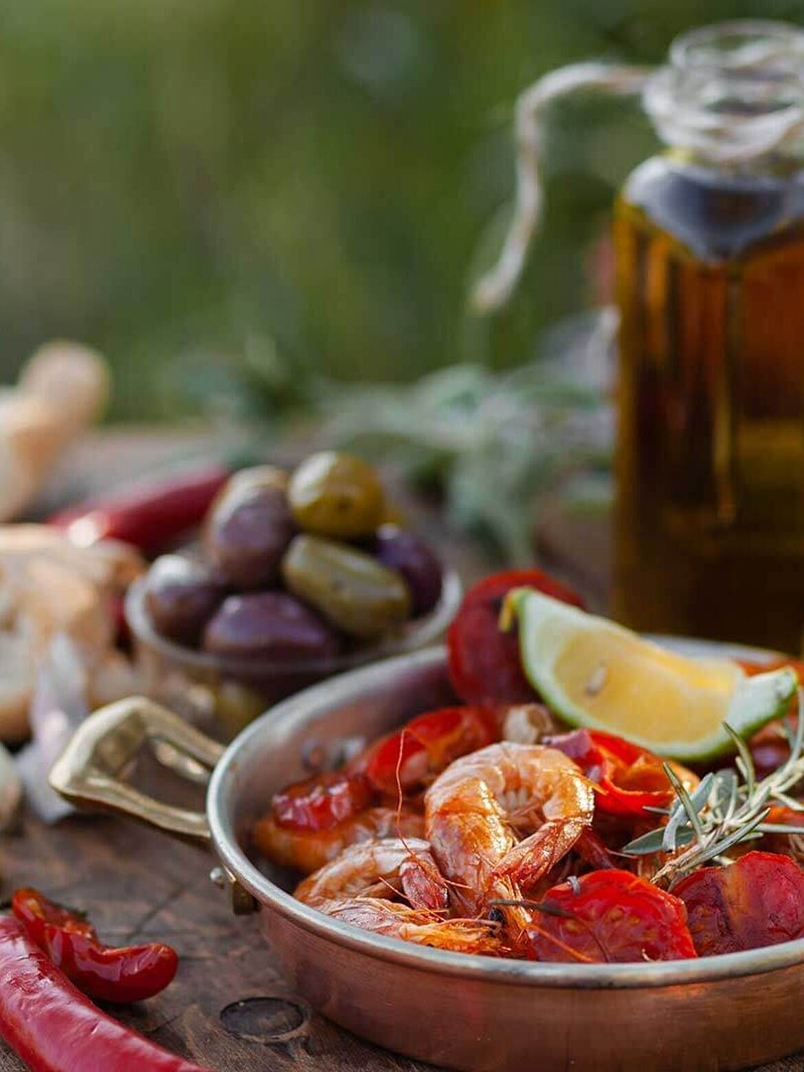 Food plate with prawns and olive oil