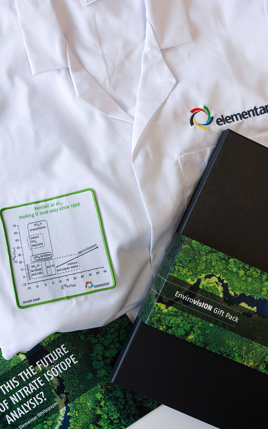 Image of the lab coat and documentation included in the Elementar EGU giveaway.