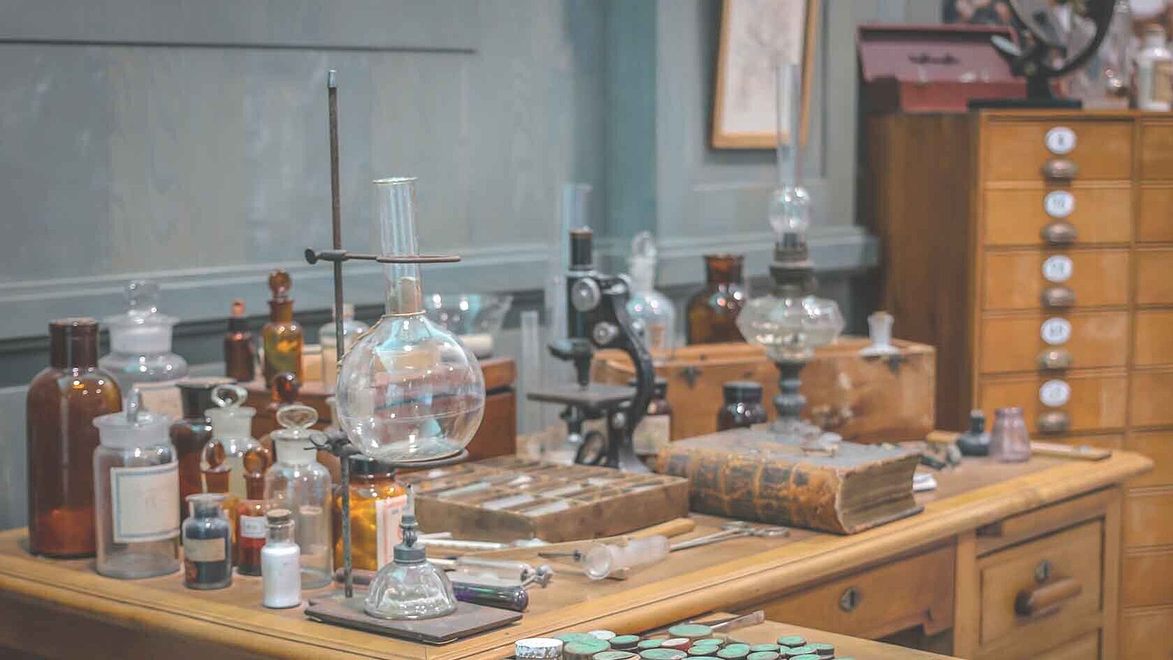 Old science lab with chemicals and burner