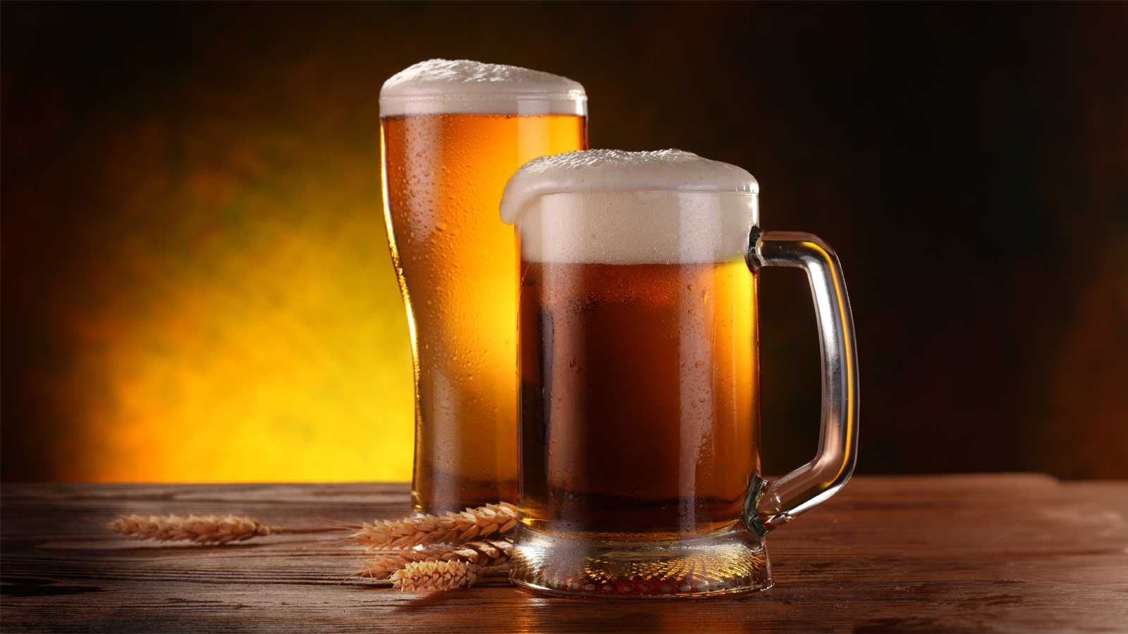 2 beer mugs with beer